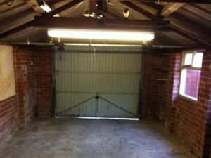 Garage Clearance (3 of 3) - The cleared garage with cobwebs cleaned away, ready for its new owners