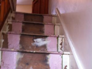 Carpet Fitting (1 of  3) - The staircase of a Lancaster home prepared for a new carpet with existing nails and gripper rods removed